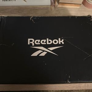 Brand new women’s Reebok, never worn still has tags and box.